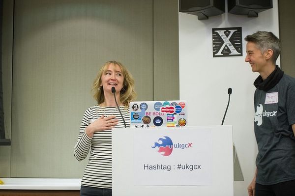 Me smiling & slightly nervously stood next to the host (Janet Hughes) who is smiling enthusiastically.  Doing first pitch